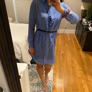 Blue long sleeve dress with ruffle. Belt included